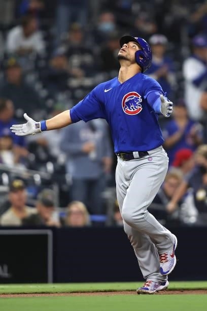 Willson Contreras of the Chicago Cubs reacts as he rounds third base after hitting a solo homerun during the fourth inning of a game against the San...