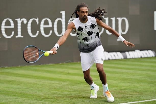 Dustin Brown of Germany plays a forehand in his match against Nikoloz Basilashvili of Georgia during day 2 of the MercedesCup at Tennisclub...
