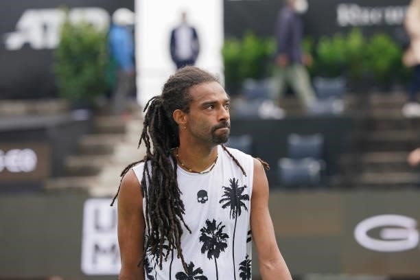 Dustin Brown of Germany looks dejected during his match against Nikoloz Basilashvili of Georgia during day 2 of the MercedesCup at Tennisclub...