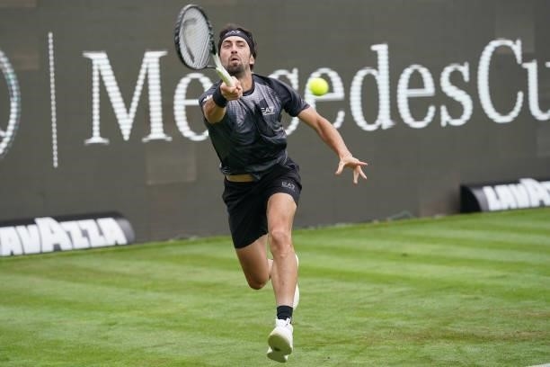 Nikoloz Basilaszvili of Georgia plays a forehand in his match against Dustin Brown of Germany during day 2 of the MercedesCup at Tennisclub...