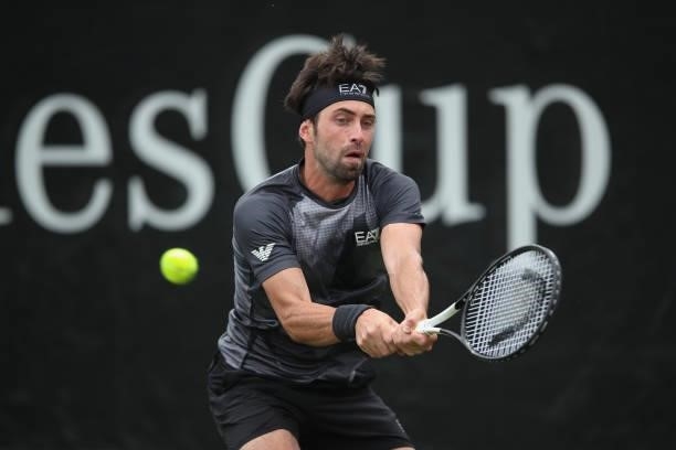 Nikoloz Basilashvili of Georgia plays a backhand in his match against Dustin Brown of Germany during day 2 of the MercedesCup at Tennisclub...