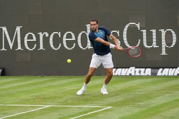 Marin Cilic of Croatia plays a backhand in his match against Rudolf Molleker of Germany during day 2 of the MercedesCup at Tennisclub Weissenhof on...