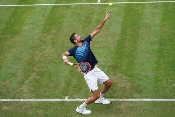 Marin Cilic of Croatia makes a service in his match against Rudolf Molleker of Germany during day 2 of the MercedesCup at Tennisclub Weissenhof on...