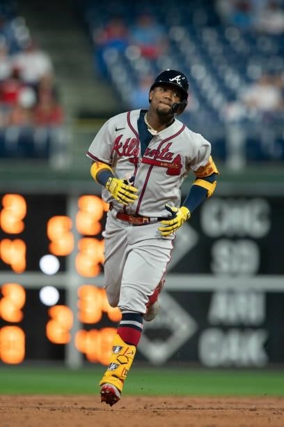 Ronald Acuna Jr. #13 of the Atlanta Braves rounds the bases after hitting a solo home run in the top of third inning against the Philadelphia...