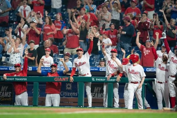 The Philadelphia Phillies dugout reacts against the Atlanta Braves at Citizens Bank Park on June 8, 2021 in Philadelphia, Pennsylvania. The Braves...