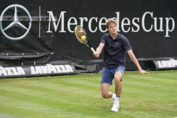 Rudolf Molleker of Germany plays a forehand in his match against Marin Cilic of Croatia during day 2 of the MercedesCup at Tennisclub Weissenhof on...