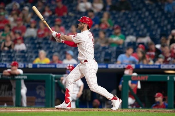 Bryce Harper of the Philadelphia Phillies hits a solo home run in the bottom of the fourth inning against the Atlanta Braves at Citizens Bank Park on...