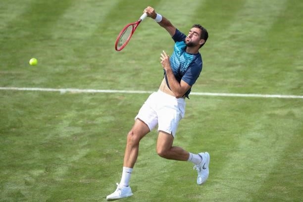 Marin Cilic of Croatia plays a smash in his match against Rudolf Molleker of Germany during day 2 of the MercedesCup at Tennisclub Weissenhof on June...