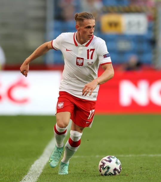 Przemyslaw Placheta of Poland runs with the ball during the international friendly match between Poland and Iceland at Stadion Poznan on June 08,...