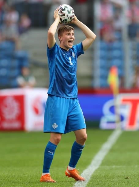 Alfons Sampsted of Iceland takes a throw-in during the international friendly match between Poland and Iceland at Stadion Poznan on June 08, 2021 in...