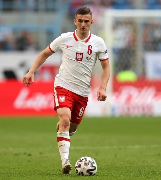 Kacper Kozlowski of Poland runs with the ball during the international friendly match between Poland and Iceland at Stadion Poznan on June 08, 2021...