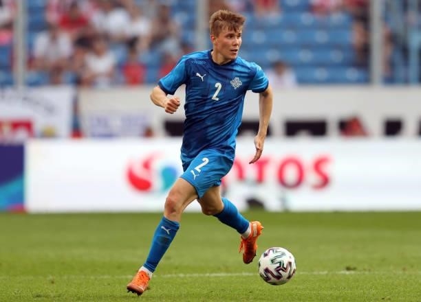 Alfons Sampsted of Iceland runs with the ball during the international friendly match between Poland and Iceland at Stadion Poznan on June 08, 2021...