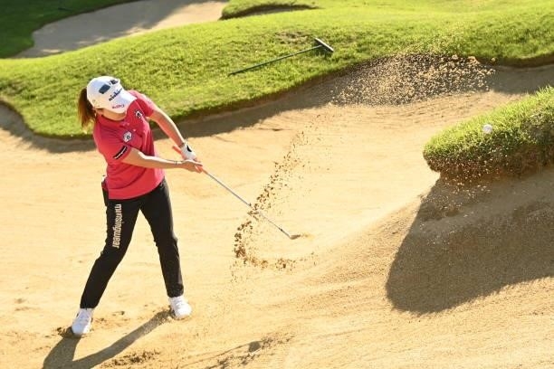 Mika Miyazato of Japan hits out from a bunker on the 12th hole during the practice round of the Ai Miyazato Suntory Ladies Open at Rokko Kokusai Golf...