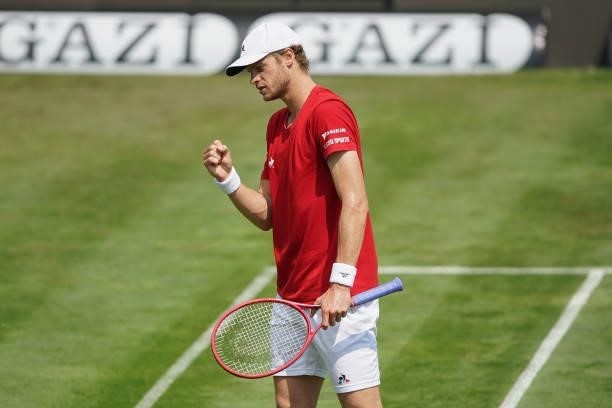 Yannick Hanfmann of Germany celebrates during his match against Jeremy Chardy of France during day 3 of the MercedesCup at Tennisclub Weissenhof on...