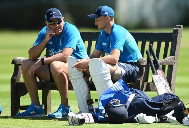 England captain Joe Root speaks with coach Chris Silverwood during a nets session at Edgbaston on June 09, 2021 in Birmingham, England.