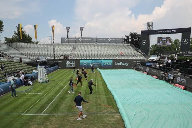Due of rain the match between Peter Gojowczyk of Germany and John Millman of Australia gets interrupted and the centre court is covered during day 3...