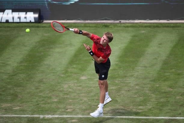 Ilga Ivashka of Belarus serves during his match against Peter Gojowczyk of Germany during day 3 of the MercedesCup at Tennisclub Weissenhof on June...