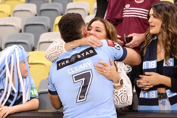 Nathan Cleary of the Blues hugs his mother after winning game one of the 2021 State of Origin series between the New South Wales Blues and the...