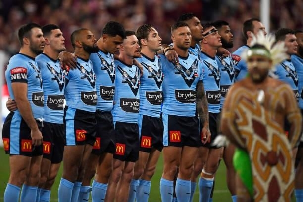 The Blues sing the national anthem before game one of the 2021 State of Origin series between the New South Wales Blues and the Queensland Maroons at...