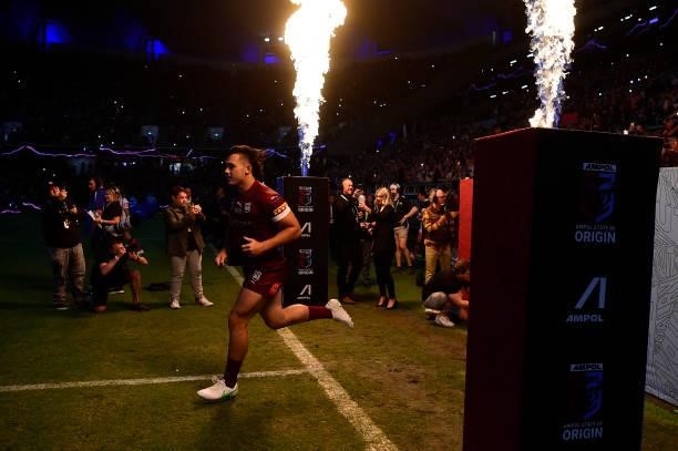 Tino Fa'asuamaleaui of the Maroons runs onto the field before game one of the 2021 State of Origin series between the New South Wales Blues and the...
