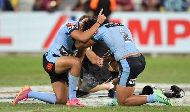 Brian To'o and Jarome Luai of the Blues embrace after winning game one of the 2021 State of Origin series between the New South Wales Blues and the...