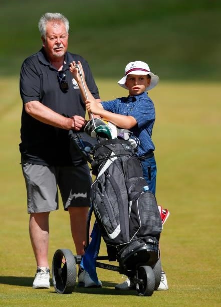 Karl Stenson son of Henrik Stenson of Sweden plays in the pro-am with his grandfather Ingemar Stenson ahead of the Scandinavian Mixed Hosted by...