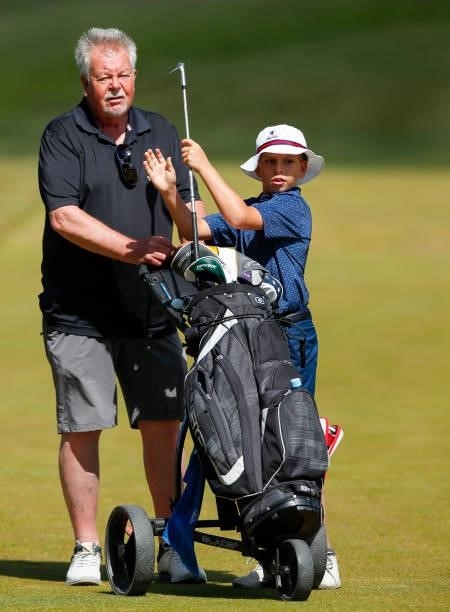 Karl Stenson son of Henrik Stenson of Sweden plays in the pro-am with his grandfather Ingemar Stenson ahead of the Scandinavian Mixed Hosted by...