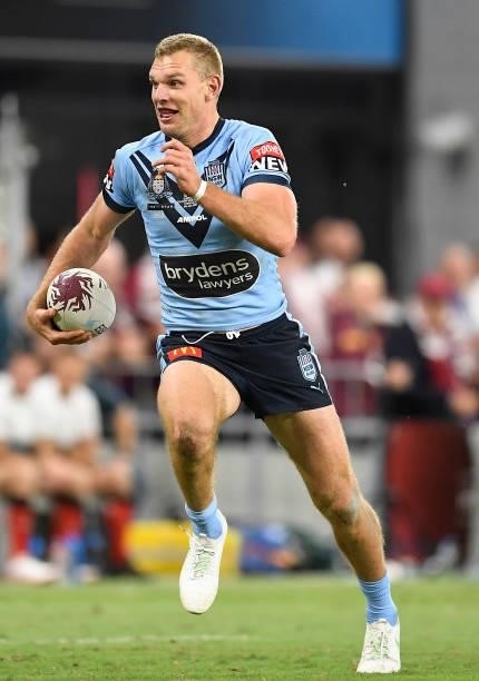 Tom Trbojevic of the Blues runs to score a try during game one of the 2021 State of Origin series between the New South Wales Blues and the...