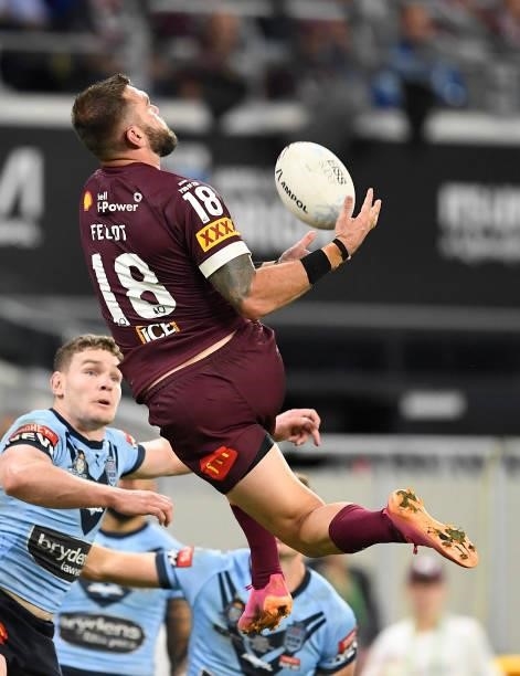 Kyle Feldt of the Maroons takes a high ball during game one of the 2021 State of Origin series between the New South Wales Blues and the Queensland...