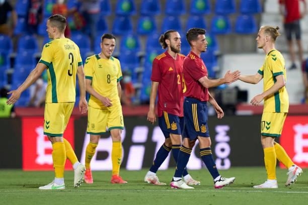 Antonio Blanco of Spain U21 salutes with Justas Lasickas of Lithuania after the game during the international friendly match between Spain U21 and...
