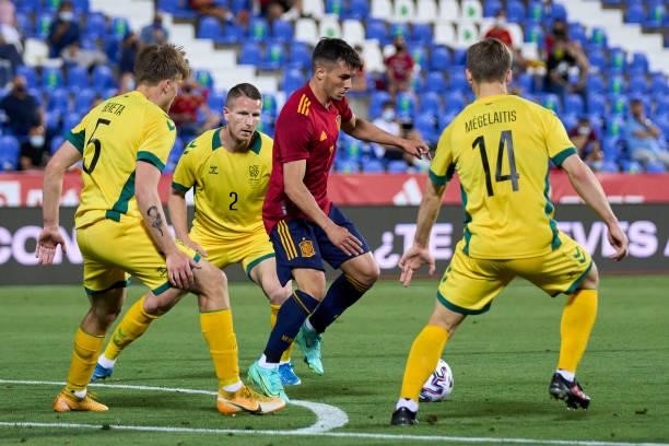 Brahim Diaz of Spain U21 battle for the ball with Megelaitis of Lithuania during the international friendly match between Spain U21 and Lithuania at...
