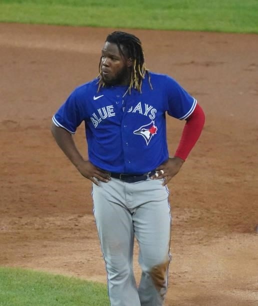 Vladimir Guerrero Jr. #27 of the Toronto Blue Jays reacts after being out at second during the third inning of a game against the Chicago White Sox...