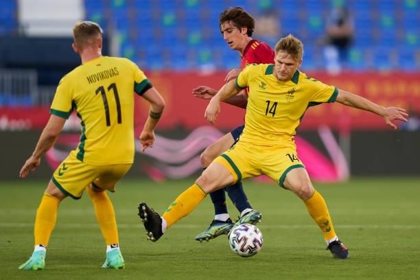 Bryan Gil of Spain U21 battle for the ball with Megelaitis of Lithuania during the international friendly match between Spain U21 and Lithuania at...