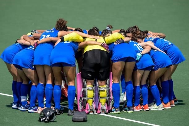 Players of Italy form a huddle during the Euro Hockey Championships match between Germany and Italy at Wagener Stadion on June 9, 2021 in Amstelveen,...