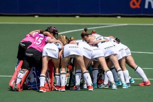 Players of Germany form a huddle during the Euro Hockey Championships match between Germany and Italy at Wagener Stadion on June 9, 2021 in...