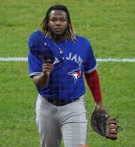 Vladimir Guerrero Jr. #27 of the Toronto Blue Jays reacts at the end of the third inning of a game against the Chicago White Sox at Guaranteed Rate...
