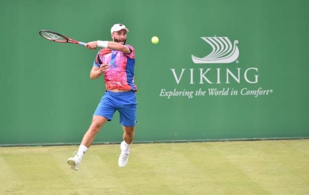 Liam Broady of Great Britain plays a forehand shot against Denis Kudla of United States in the Men’s Single on day five of the Viking Open at...
