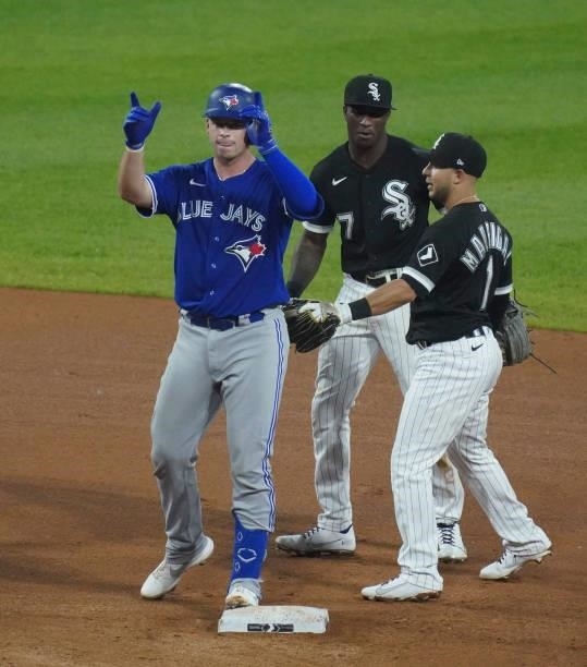 Riley Adams of the Toronto Blue Jays reacts after his double against the Chicago White Sox at Guaranteed Rate Field on June 08, 2021 in Chicago,...