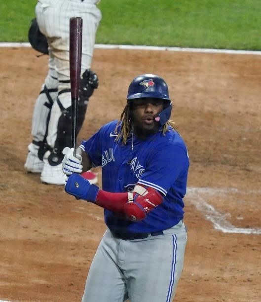 Vladimir Guerrero Jr. #27 of the Toronto Blue Jays reacts after striking out during the seventh inning of a game against the Chicago White Sox at...