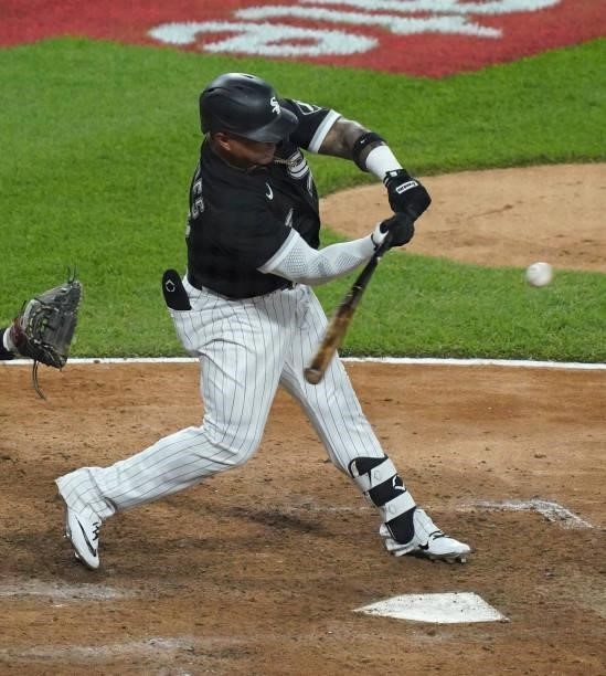 Yermin Mercedes of the Chicago White Sox hits a single during the eighth inning of a game against the Toronto Blue Jays at Guaranteed Rate Field on...