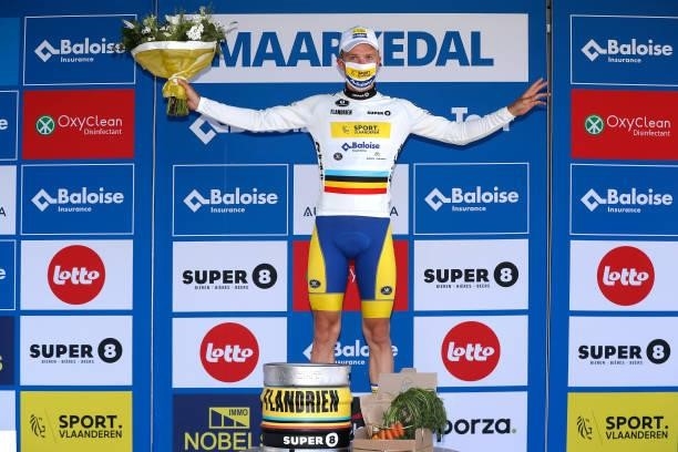 Robbe Ghys of Belgium and Team Sport Vlaanderen - Baloise stage winner White most combative rider jersey celebrates at podium during the 90th Baloise...