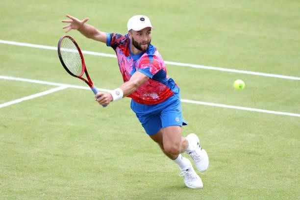 Liam Broady of Great Britain plays a forehand against Denis Kudla of United States during Day 5 of the Viking Nottingham Open at Nottingham Tennis...