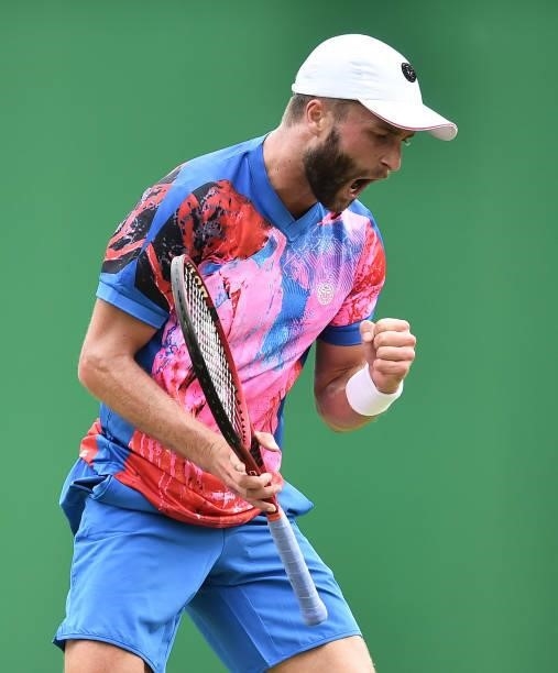Liam Broady of Great Britain celebrates as he wins a point against Denis Kudla of United States in the Men’s Single on day five of the Viking Open at...