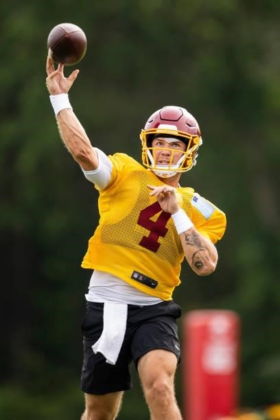 Taylor Heinicke of the Washington Football Team throws the ball during mandatory minicamp at Inova Sports Performance Center on June 9, 2021 in...