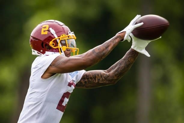 Dyami Brown of the Washington Football Team catches a pass during mandatory minicamp at Inova Sports Performance Center on June 9, 2021 in Ashburn,...