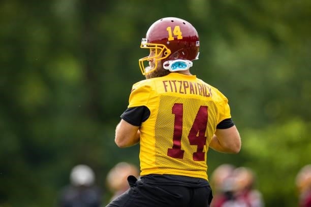 Ryan Fitzpatrick of the Washington Football Team looks to pass during mandatory minicamp at Inova Sports Performance Center on June 9, 2021 in...