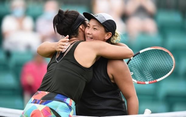 Heather Watson of Great Britain is congratulated by Tara Moore as she wins in the Women’s singles on day five of the Viking Open at Nottingham Tennis...
