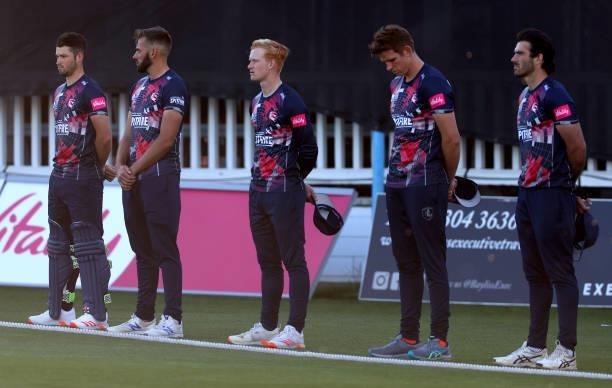 Jordan Cox of Kent and his team mates take part in a Moment of Unity prior to the Vitality T20 Blast match between Kent Spitfires and Hampshire Hawks...