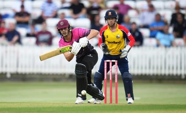 Ben Green of Somerset plays a shot as Adam Wheater of Essex looks on during the Vitality T20 Blast match between Somerset and Essex at The Cooper...