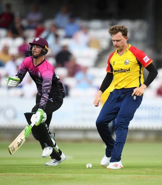 Sam Cook of Essex attempts to kick the ball onto the stumps as Eddie Byrom of Somerset runs between the wickets during the Vitality T20 Blast match...